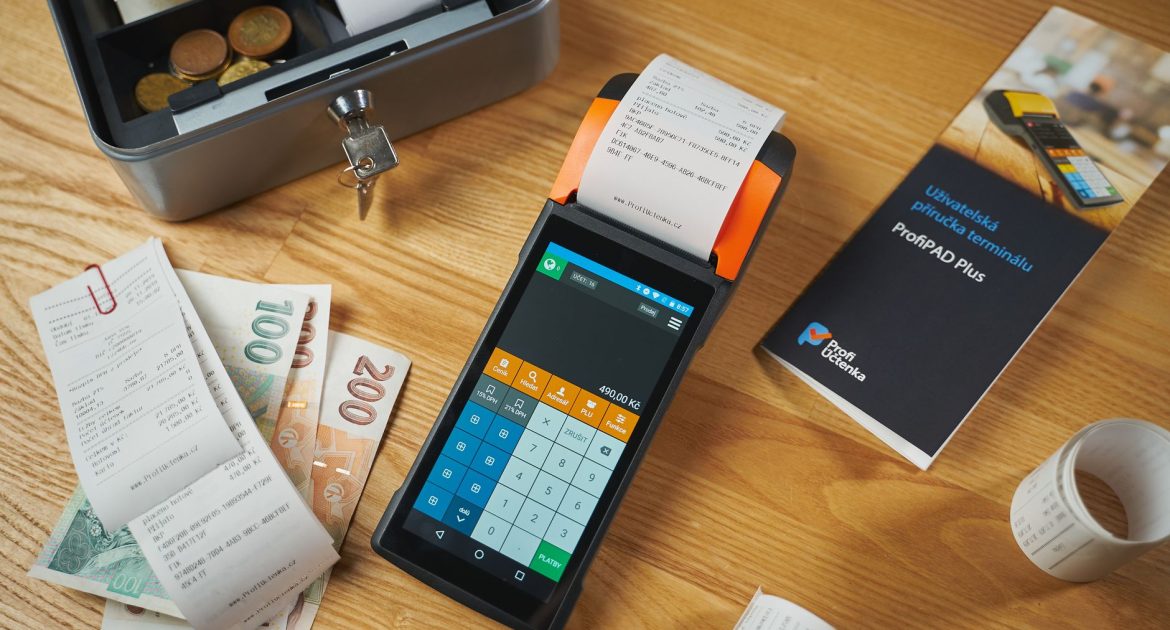 cash and payment terminal on table